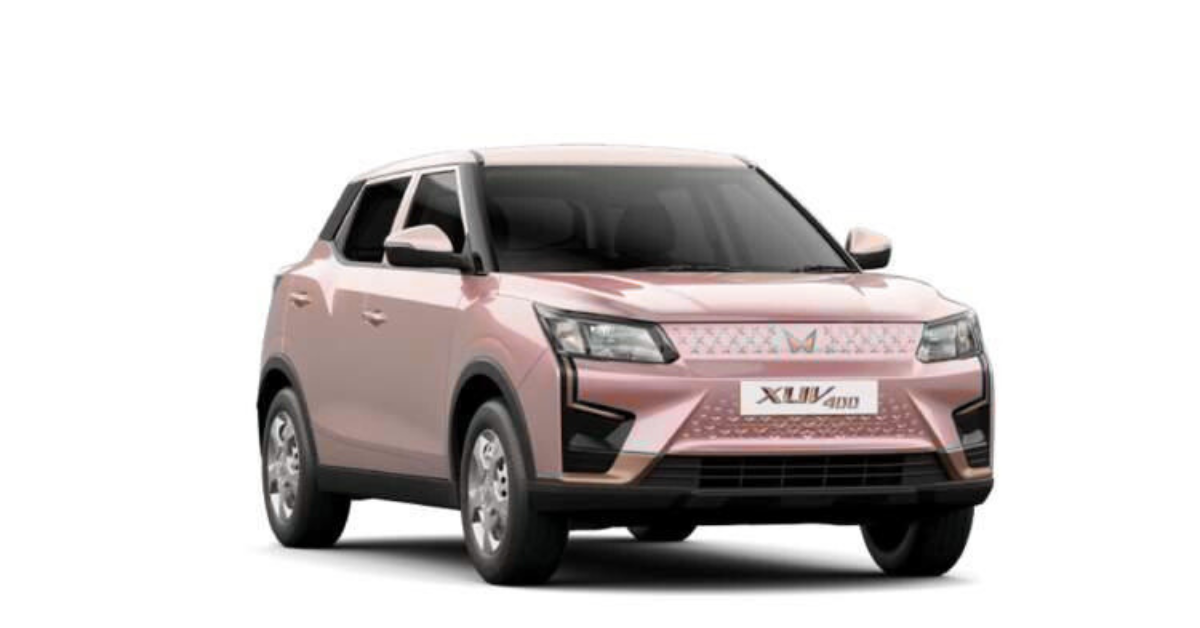 Mahindra XUV400 electric SUV plugged into EV fast charger